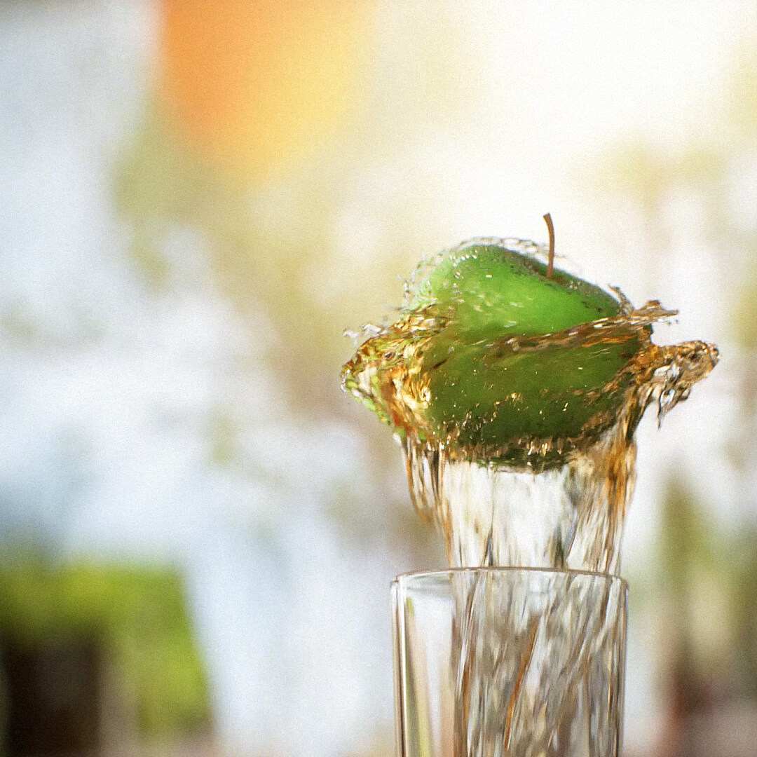 Apple dancing on a fountain of Jim Beam Apple.