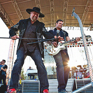 The country band Montgomery Gentry playing.